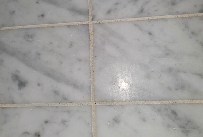 Unsightly marble shower tiles.