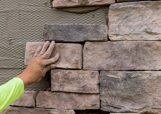 installing stacked stone wall