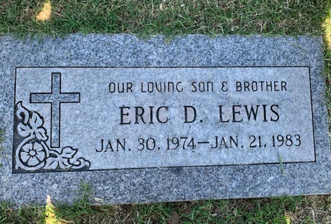 The stains have been removed from a granite headstone.