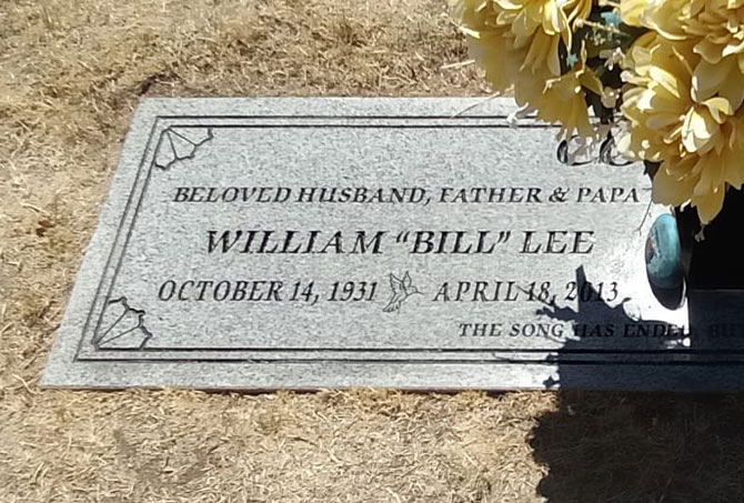 The stains have been removed from a granite headstone.