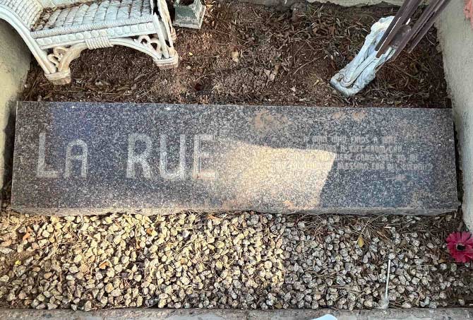 BEFORE restoration, it was difficult to read the message on this memorial stone.