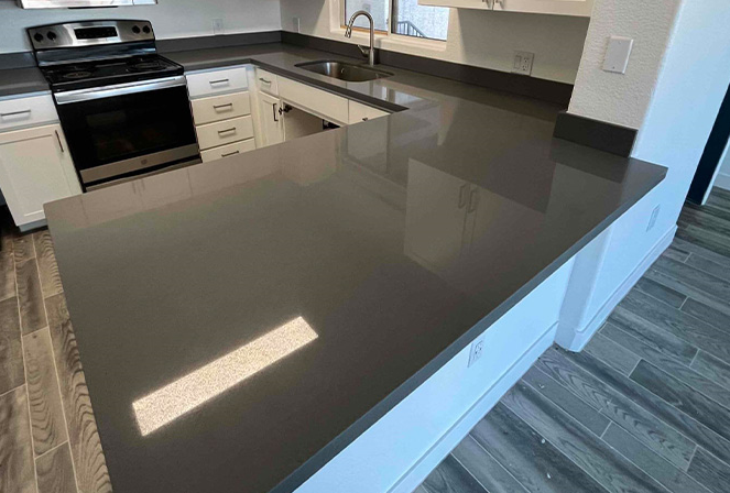 Notice the reflection of the overhead lights on the countertop Beautiful