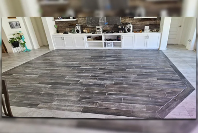 The new wood-look plank tile where the carpet used to be really updates the room