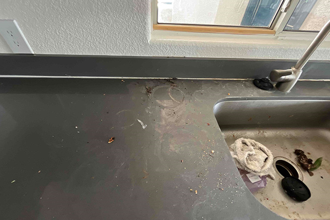 This area next to the sink had a lot of surface damage as you can see in this BEFORE image
